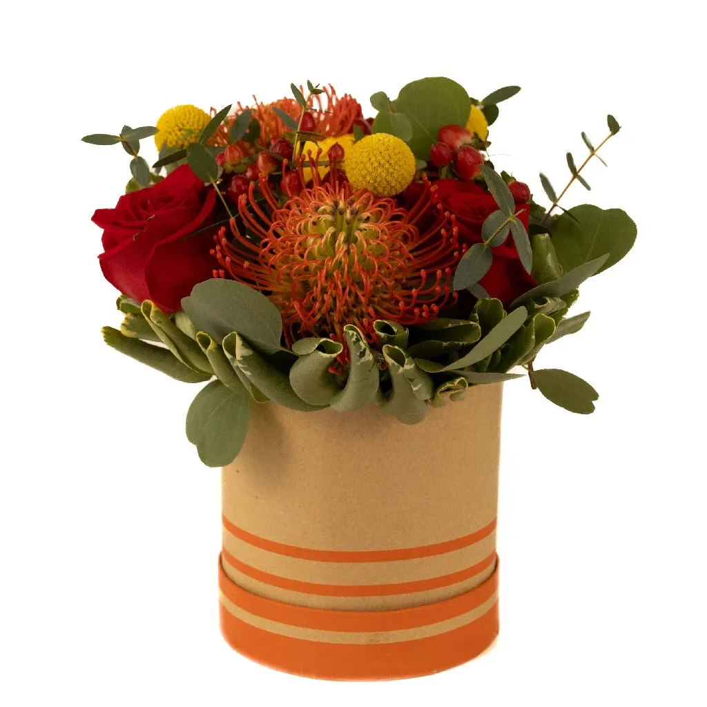 Red and Yellow Zest Flower Centerpieces