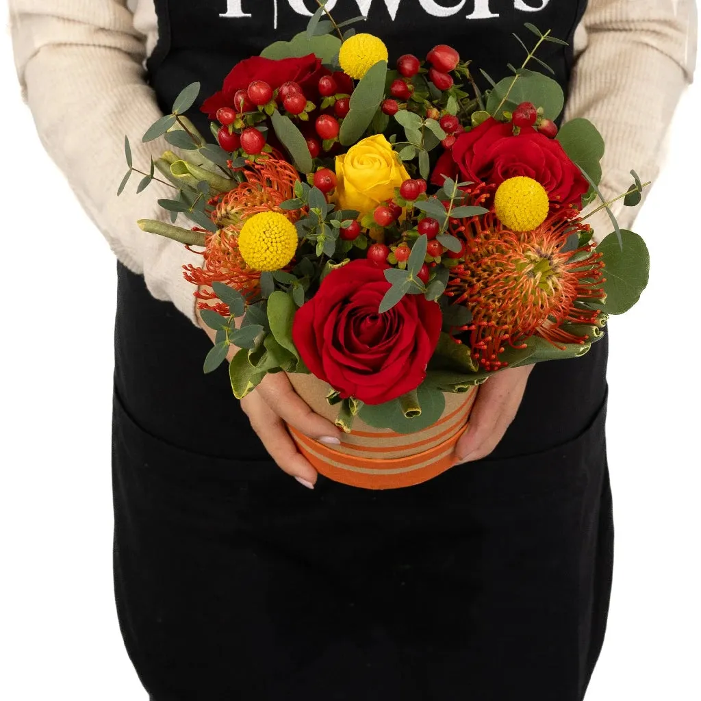 Red and Yellow Zest Flower Centerpieces